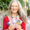 woman holding cards