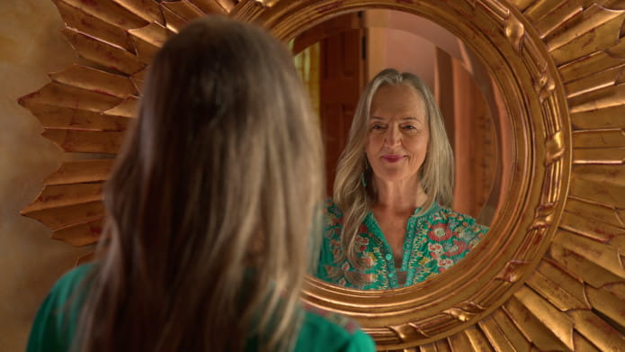 Georgette looking in mirror